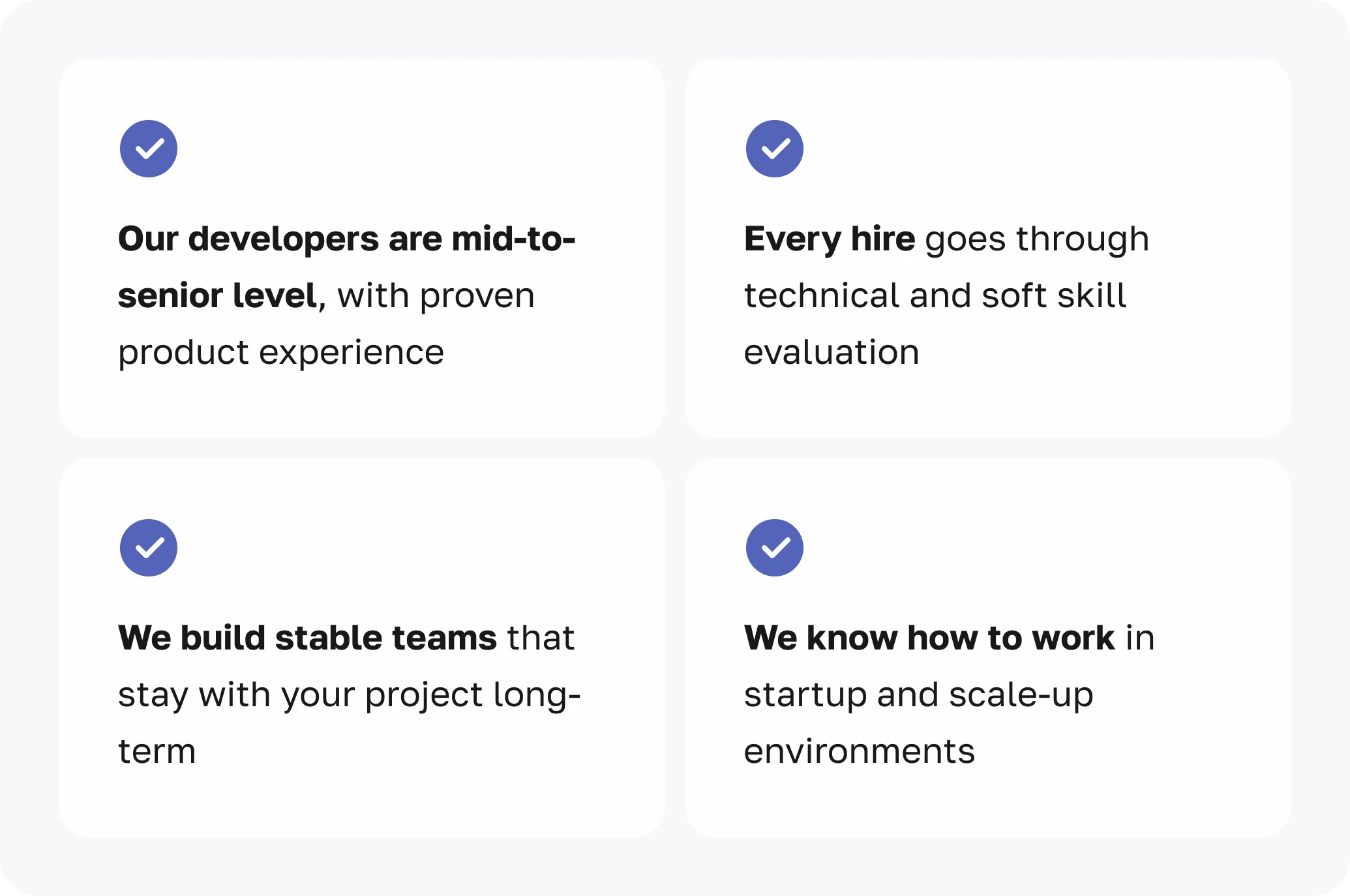 Four cards showing JetRuby’s key strengths: experienced developers, thorough hiring process, stable long-term teams, and expertise in startup and scale-up environments.
